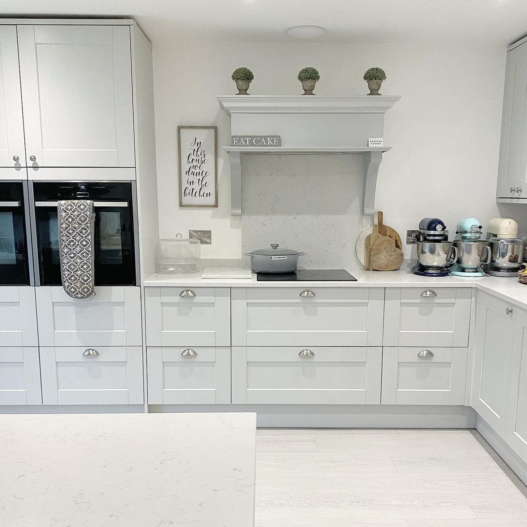 Pale Grey Drawers with Arched Drawer Pulls for a Timeless Look