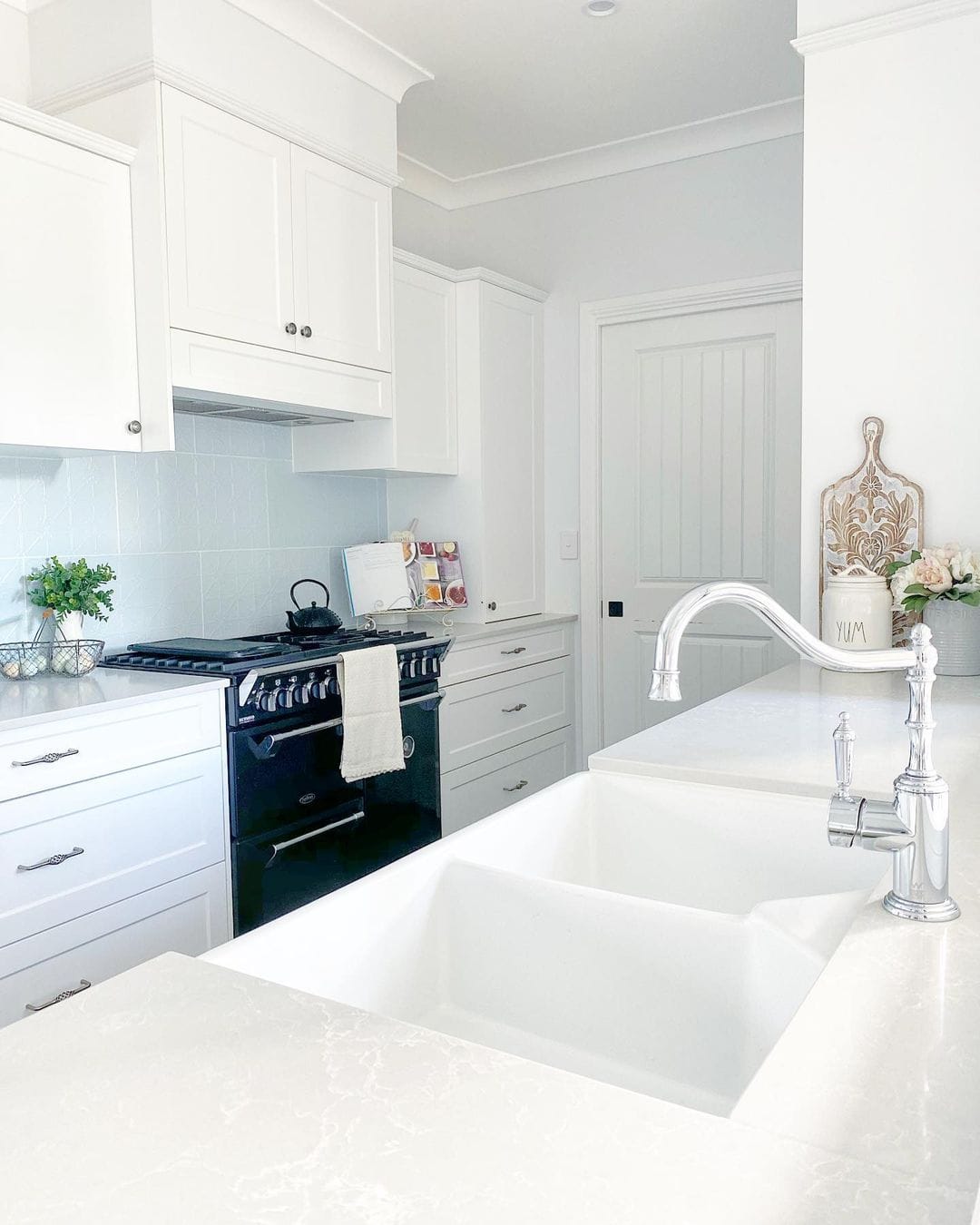 White Drawer Fronts with Ornate Silver Pulls for Vintage Charm