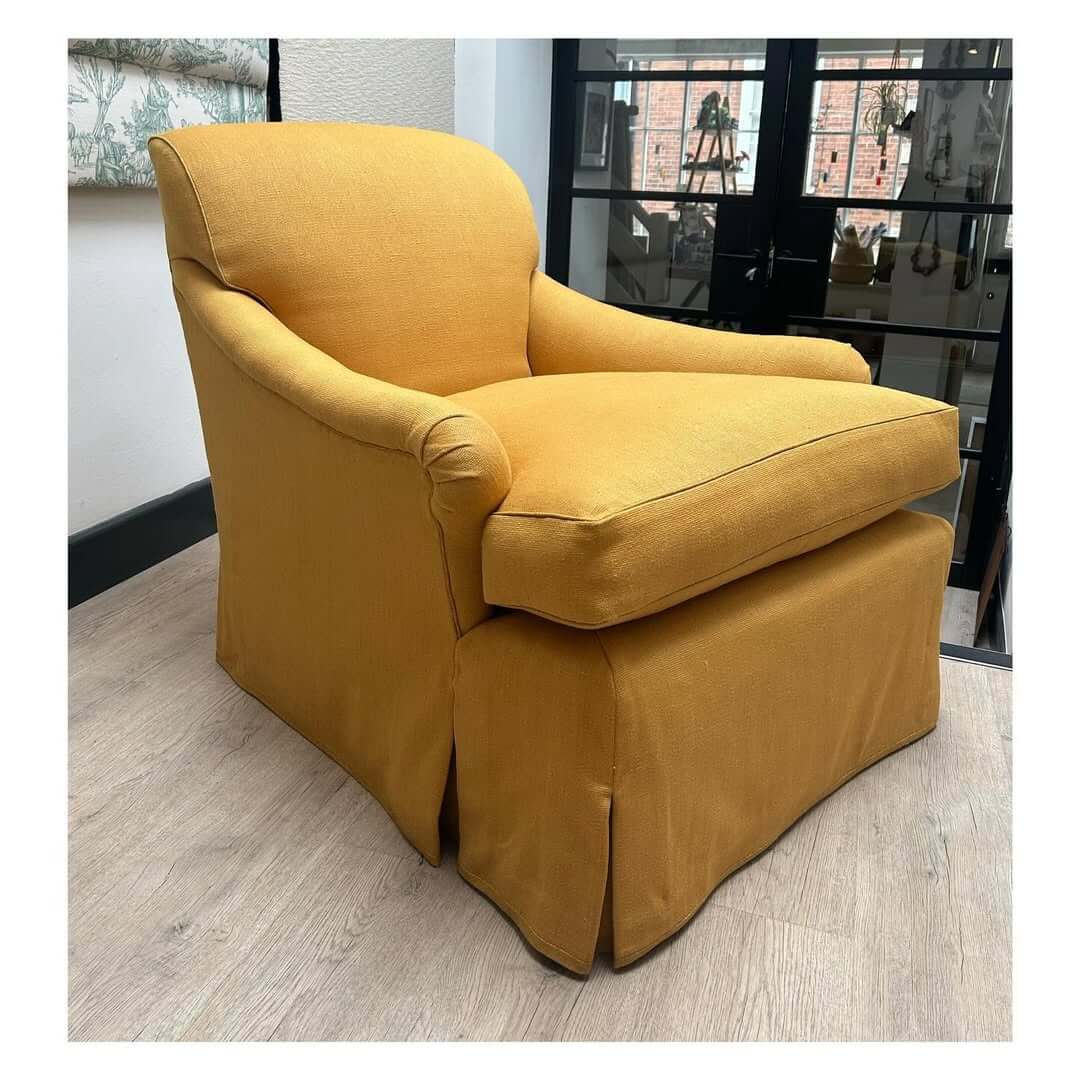 Slipcovered Chair in Warm Mustard for a Relaxed Nook