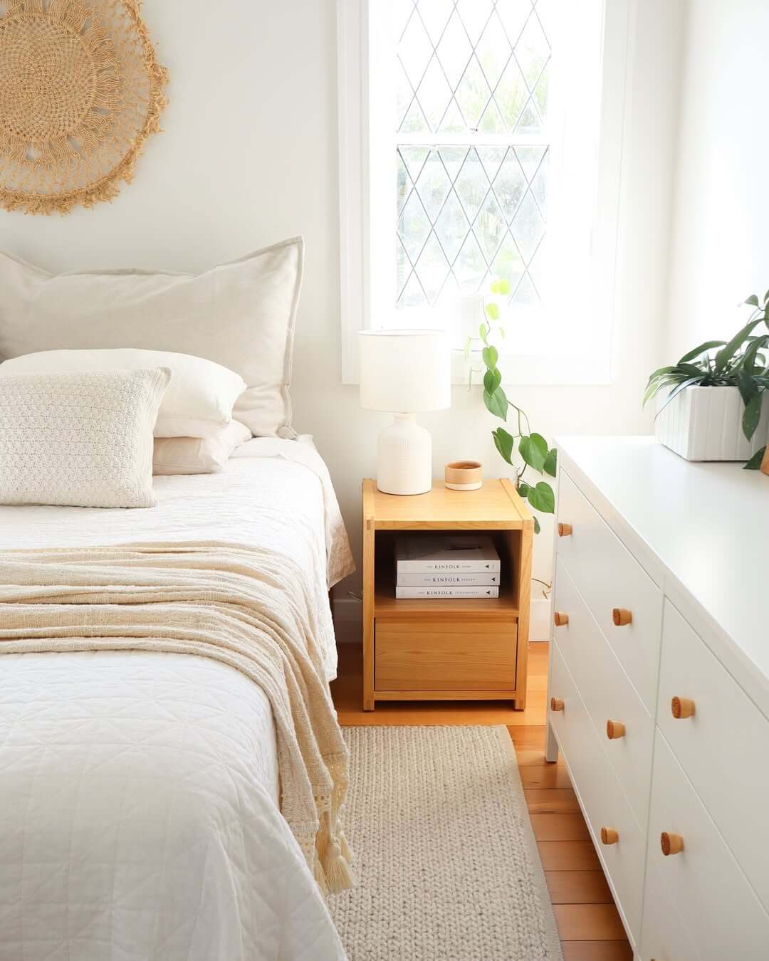 Light Wood Nightstand With Round Wooden Drawer Pulls