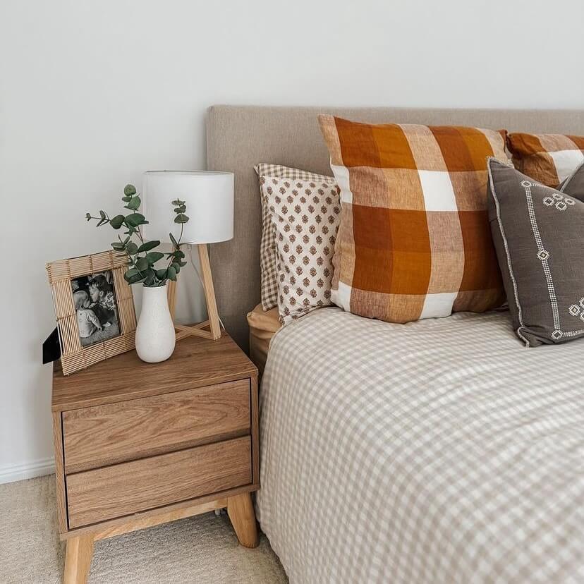 Natural Wood Nightstand With Minimalist Decor