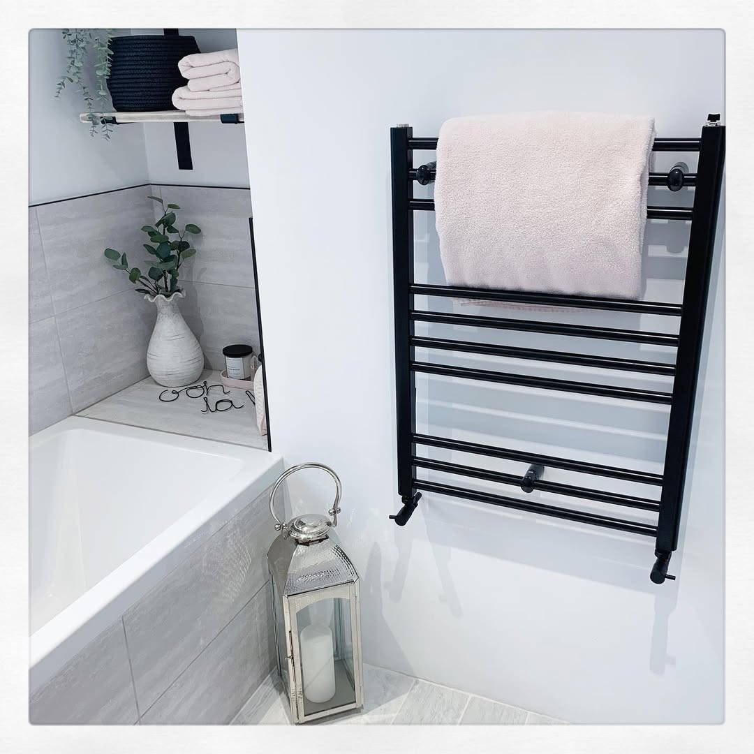 Warm Towels with a Black Heated Rail