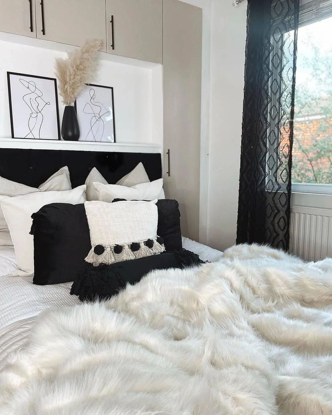 Incorporate Minimalist Line Art Above the Headboard