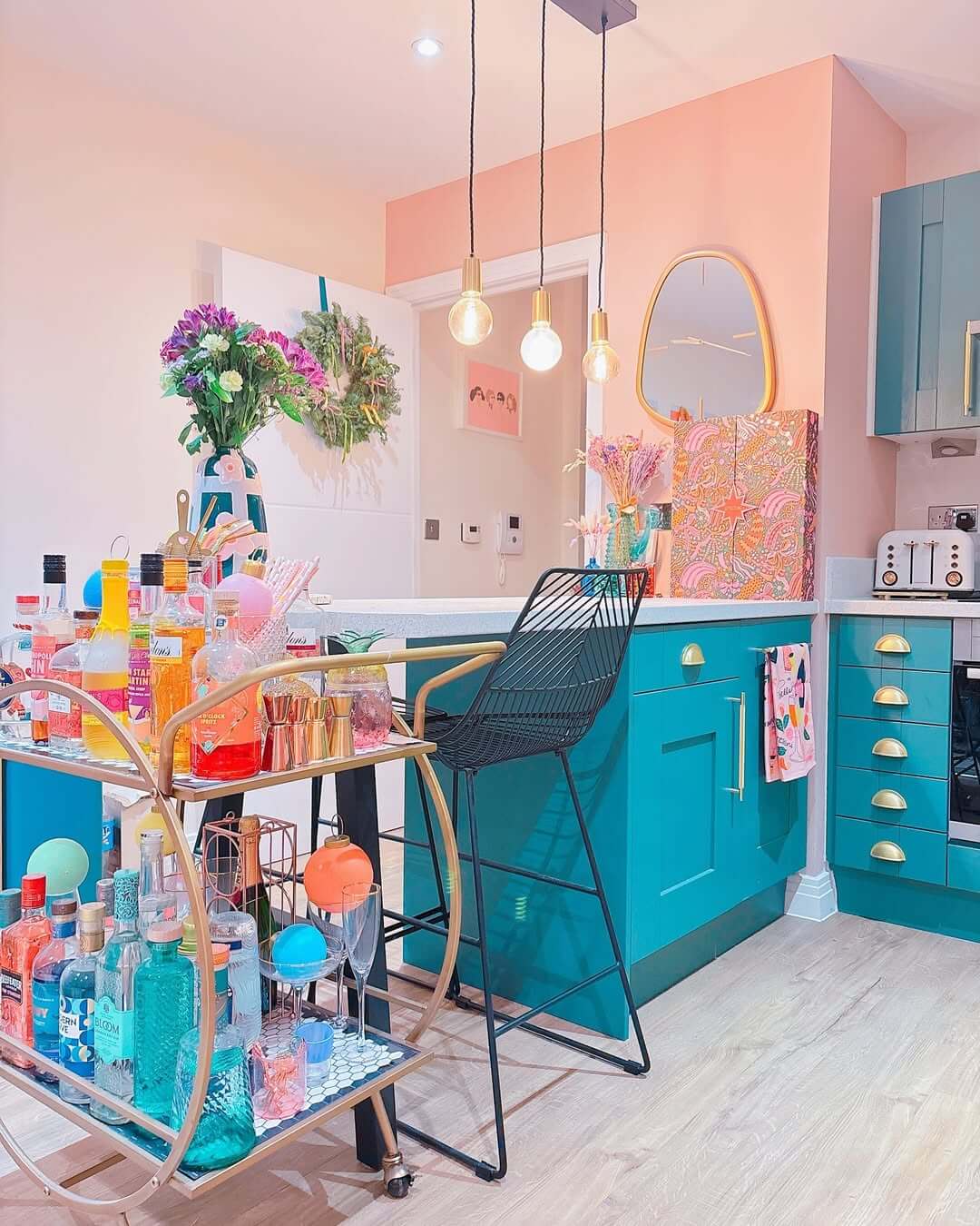 Gold Bar Cart Adds a Glamorous Touch to Teal Island