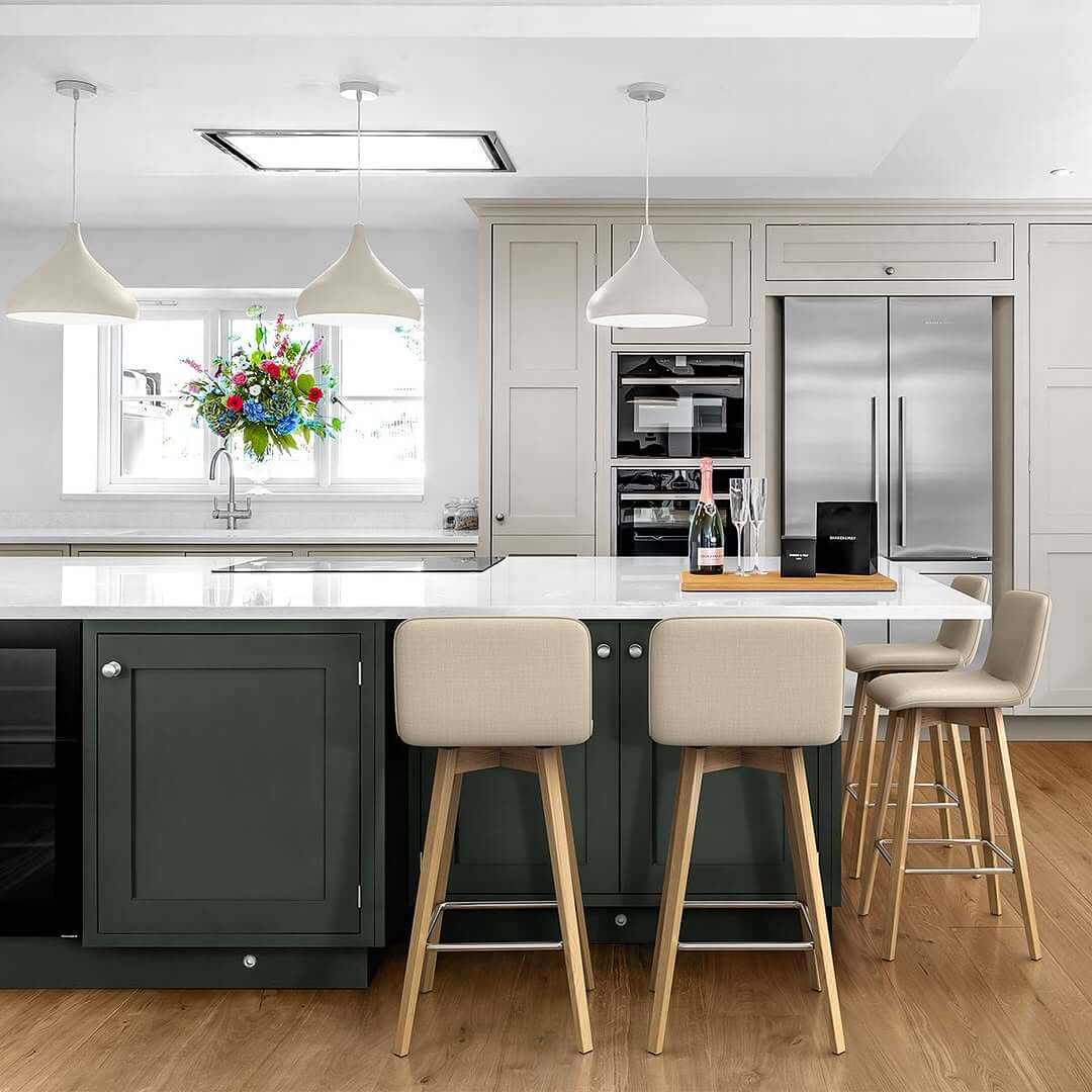 Upholstered Bar Stools Add Softness to Dark Island
