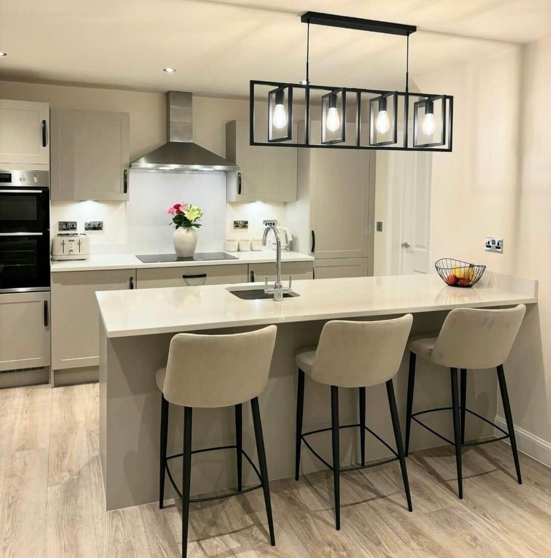 Neutral Upholstered Bar Stools Create a Soft Seating Area
