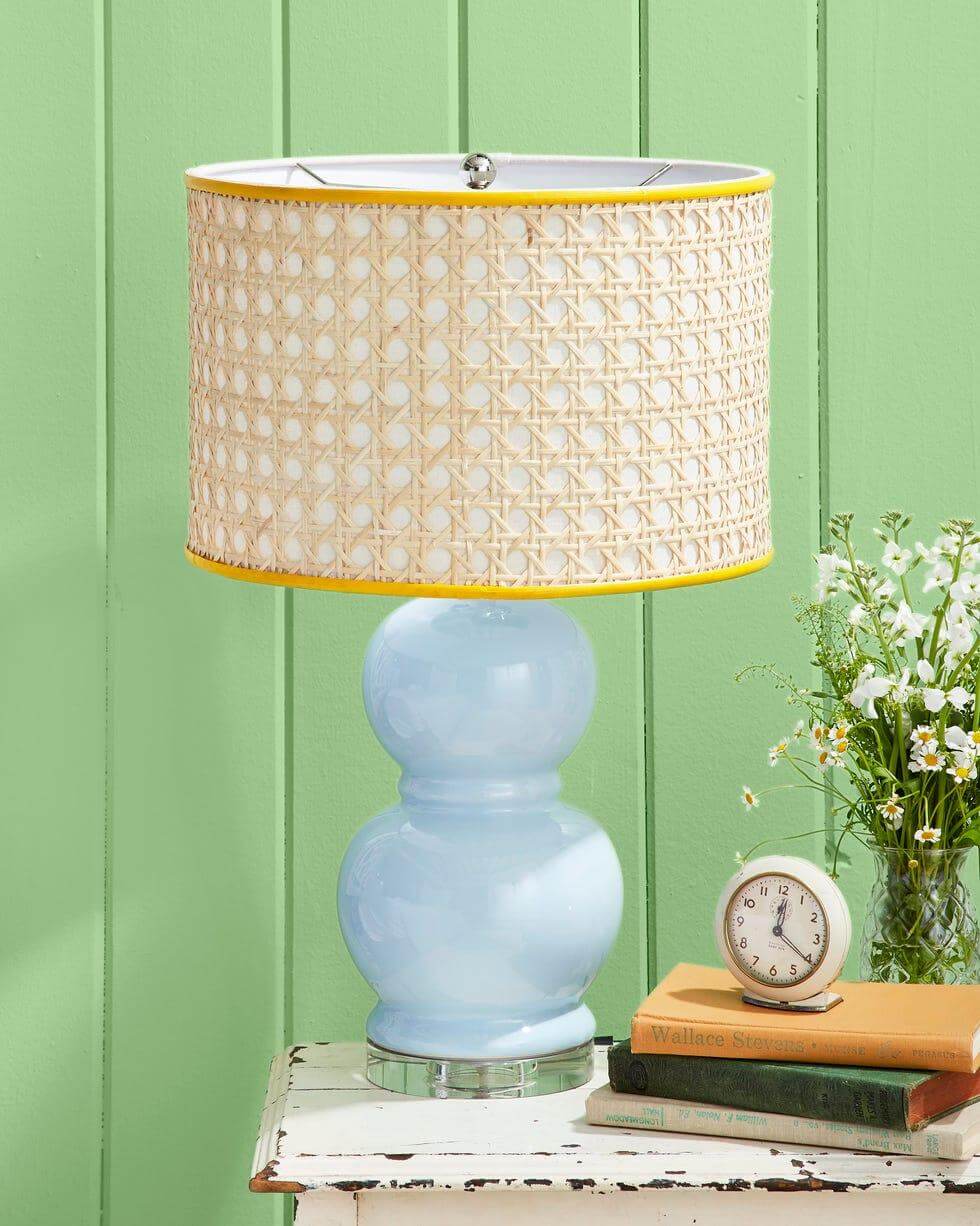Light Blue Lamp Base With Yellow-Trimmed Cane Shade