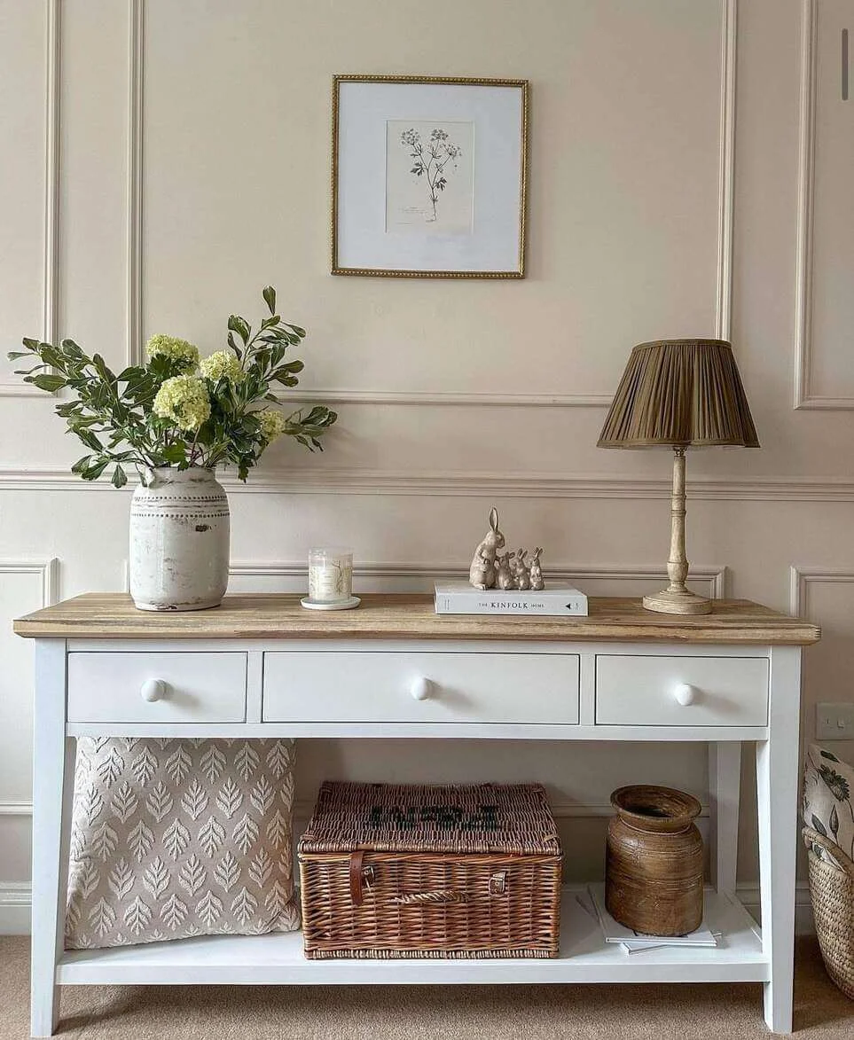 White Console with Natural Storage and Whimsical Accents