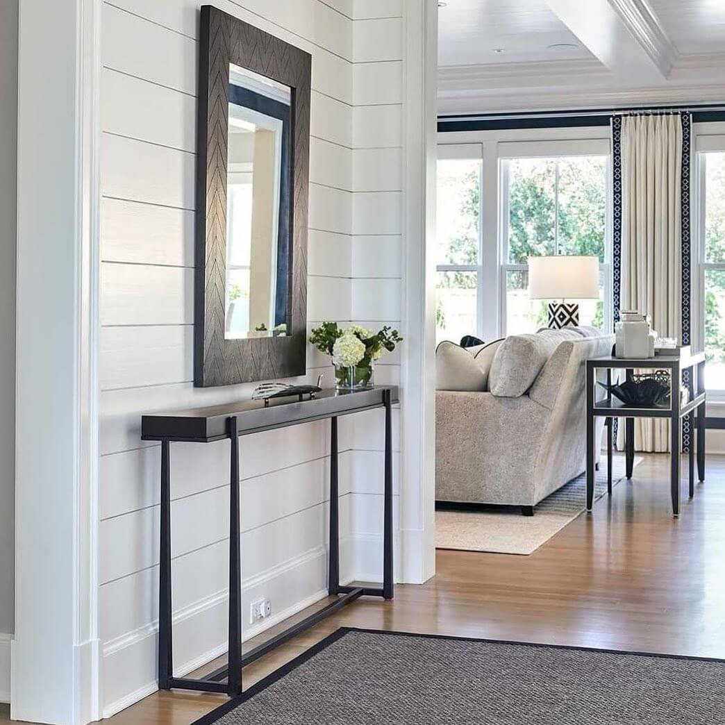 Dark Wood Mirror With Herringbone Frame Above Slim Console