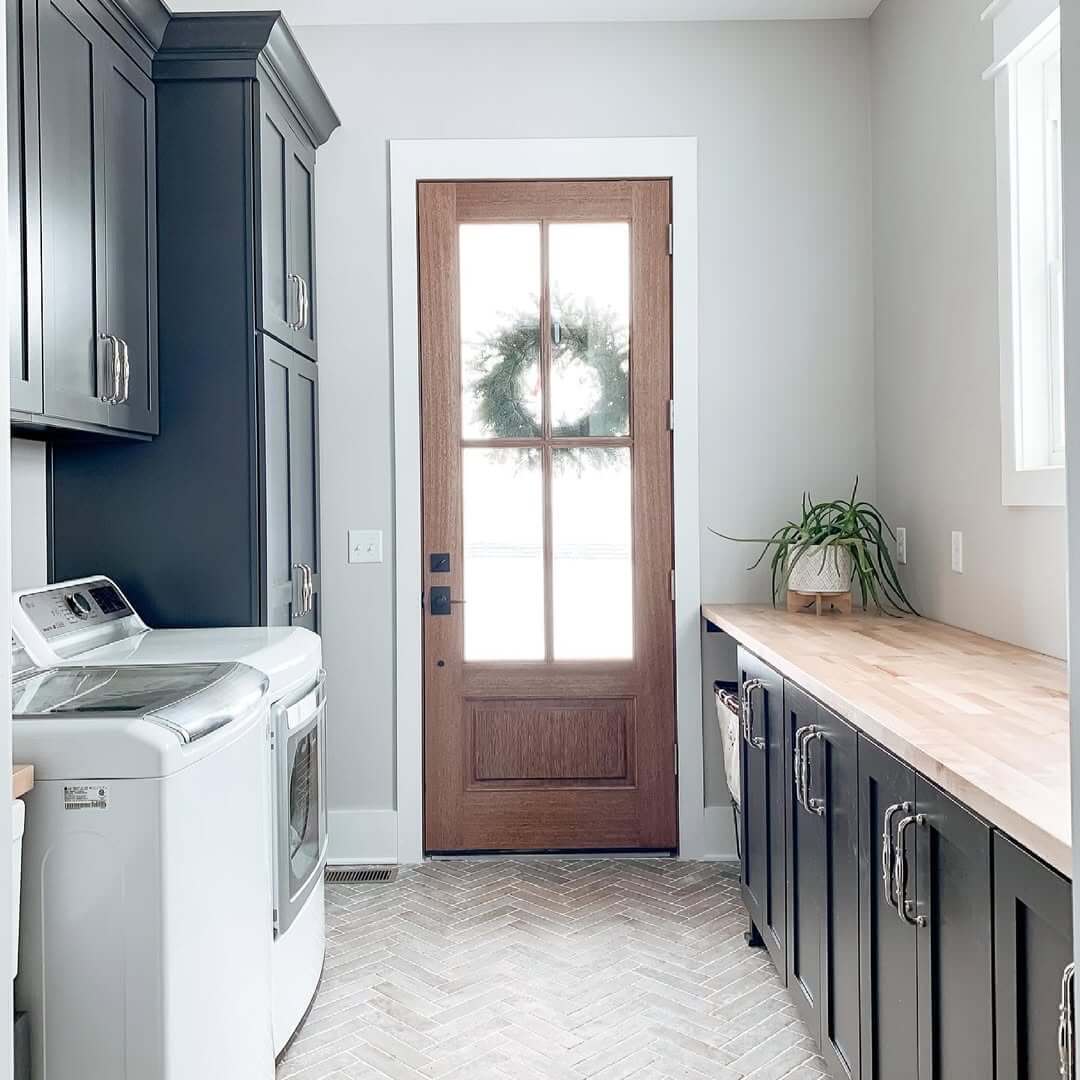 Dark Navy Cabinets With Natural Wood Countertop