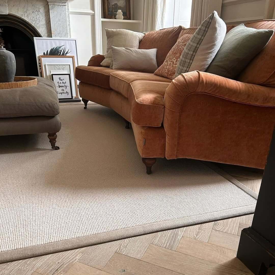 Herringbone Floors with a Layered Rug