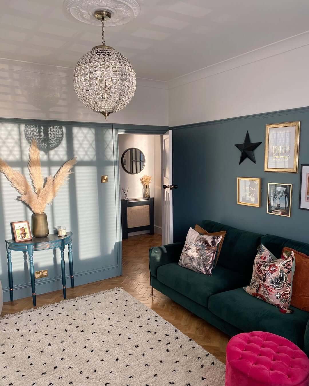 Herringbone Wood Floors Under a Textured Rug