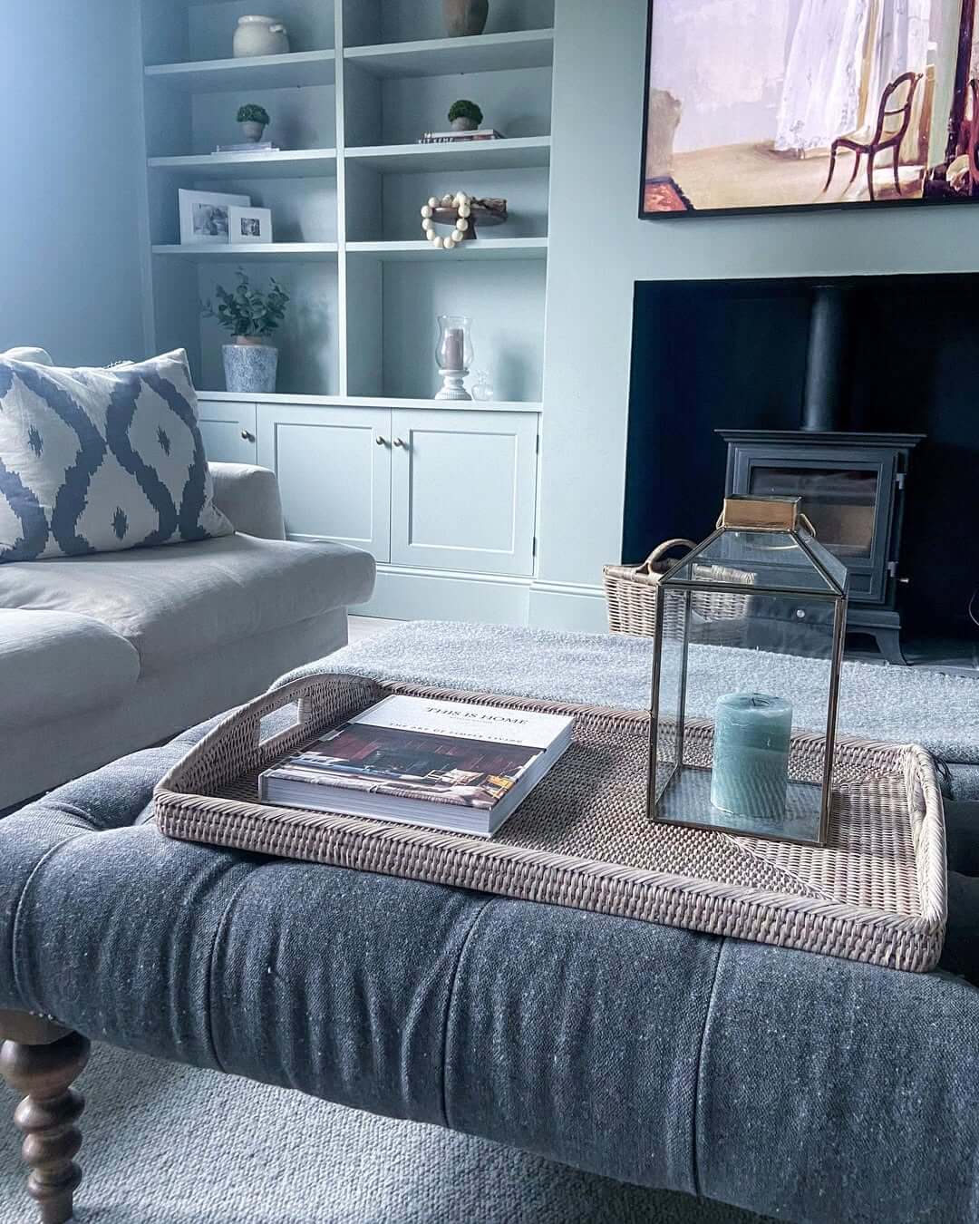 Woven Tray Organizes Coffee Table Books and Candles