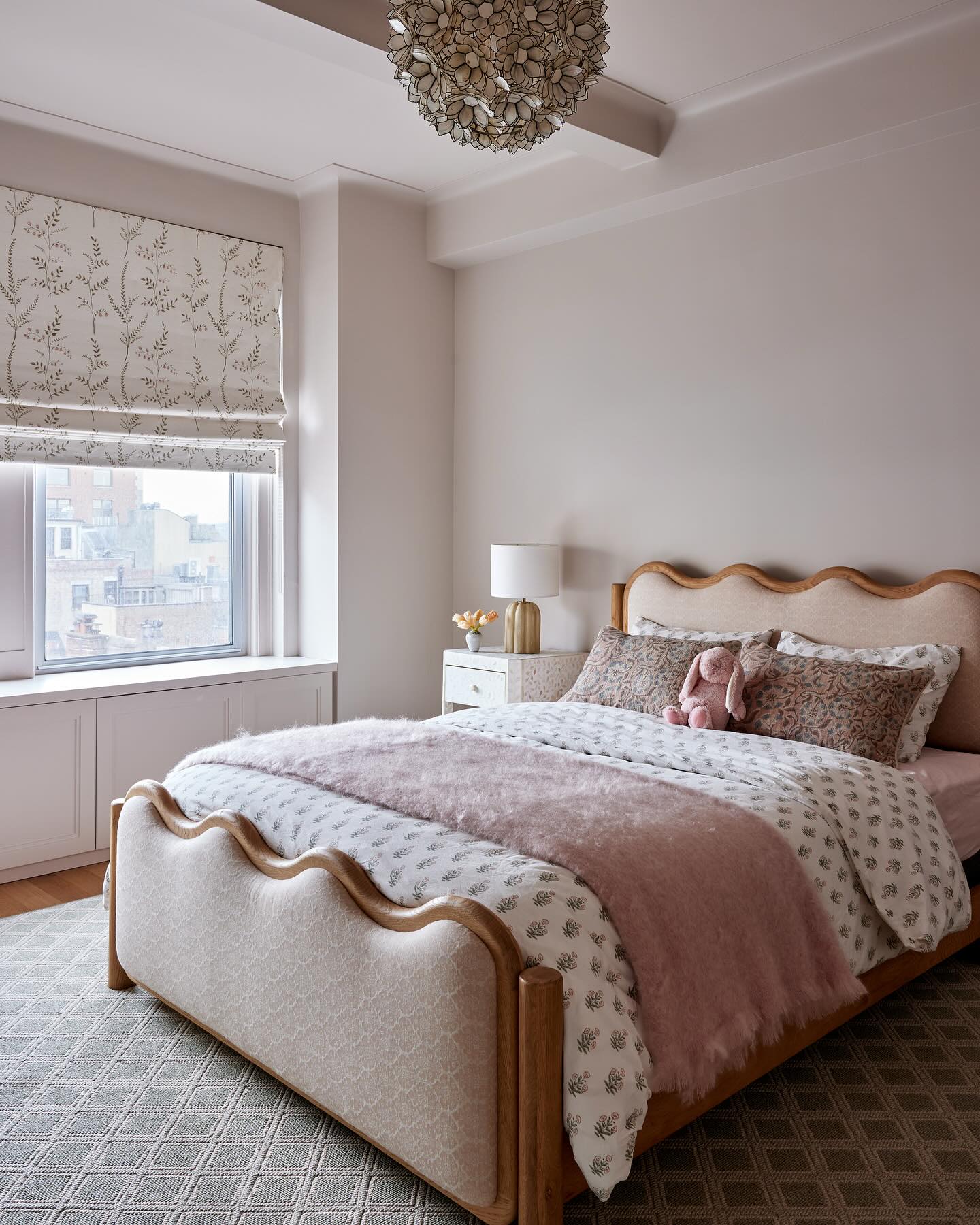 Scalloped Headboard with Natural Wood Trim Adds Whimsy