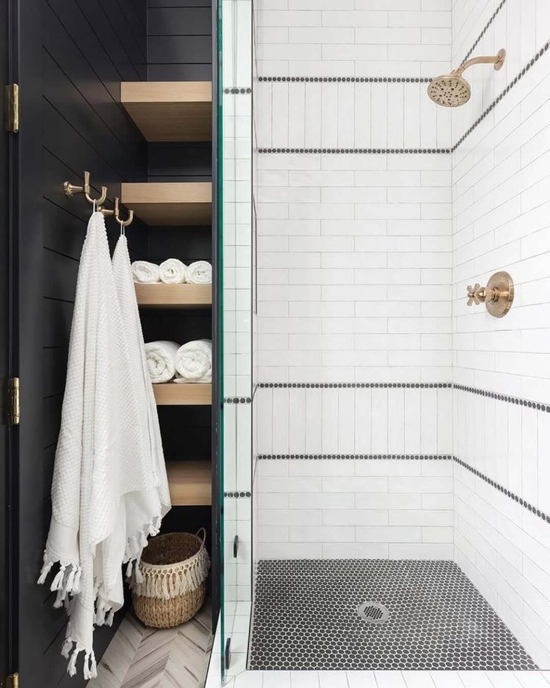 Brass Hooks Add Warmth to Dark Wood Storage