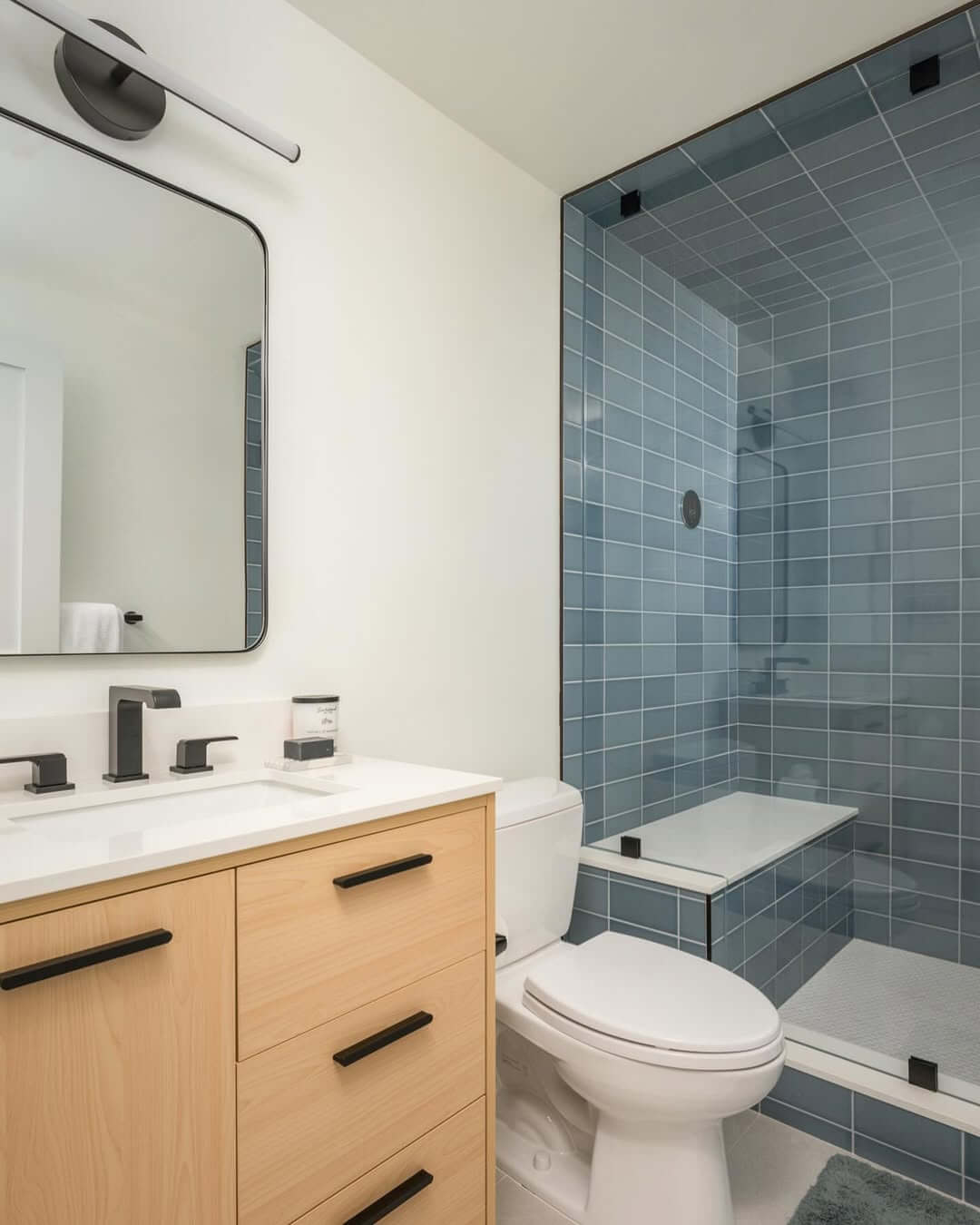 Blue Tiled Shower Enclosure With Built-In Bench