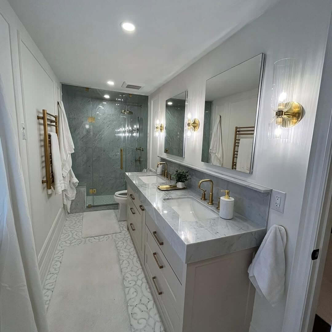 Marble Vanity With Gold Fixtures Creates a Luxe Feel