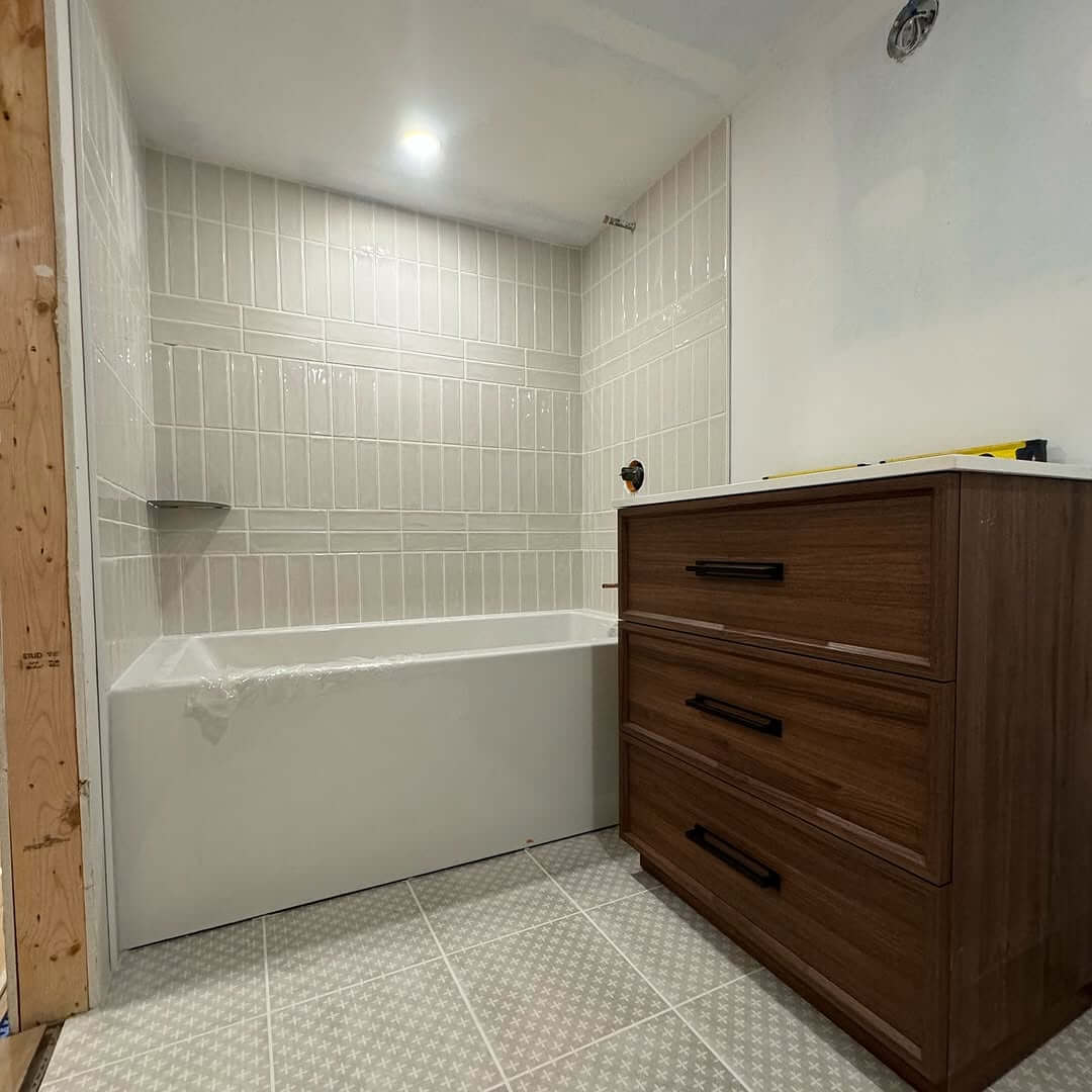 Vertical Stacked Tiles Create a Subtle Shower Accent