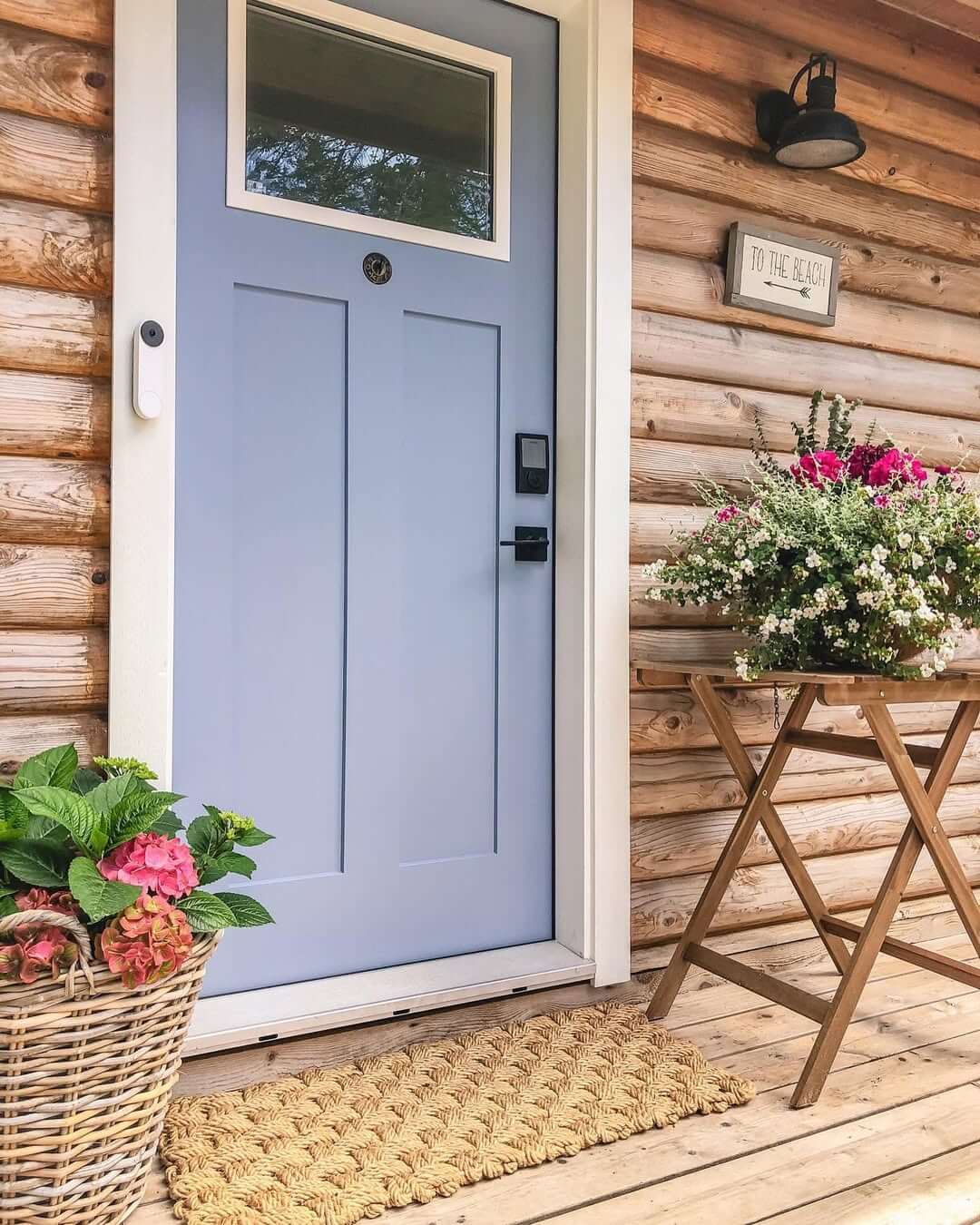 Woven Basket Holds Hydrangeas for a Casual Entryway