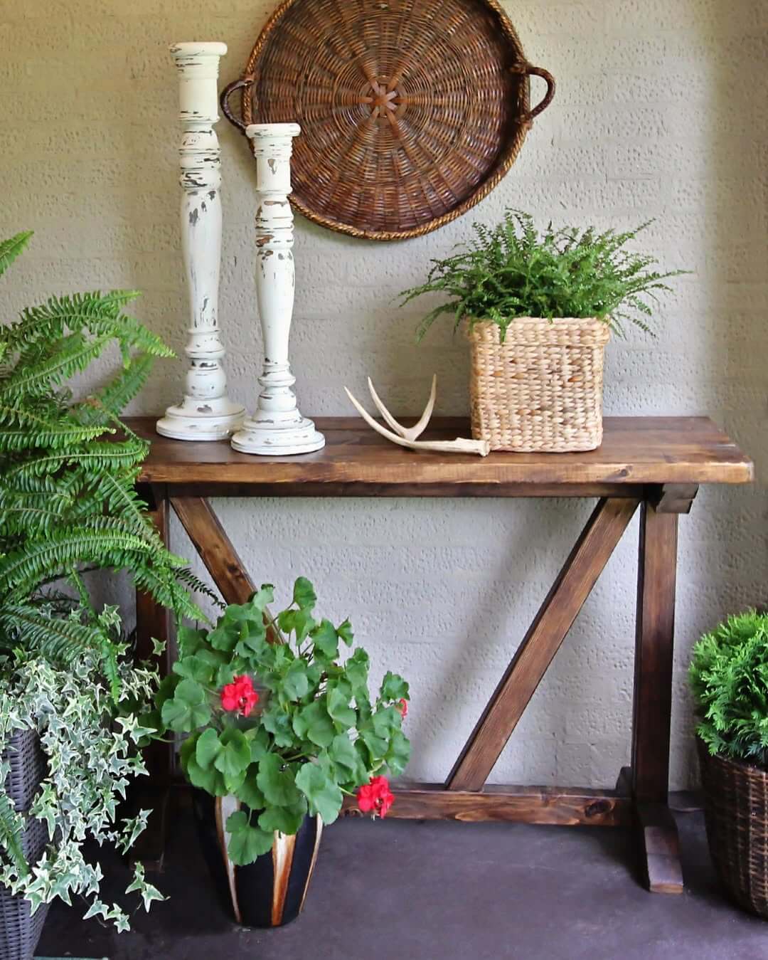 Distressed White Candlesticks Add Rustic Height To Console