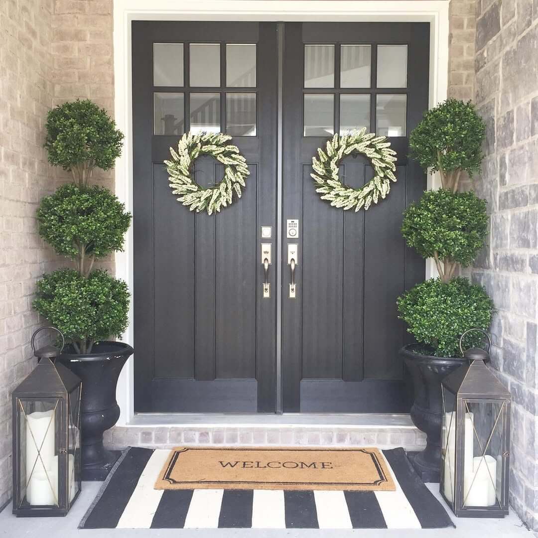 Flank Double Doors with Symmetrical Topiary Trees