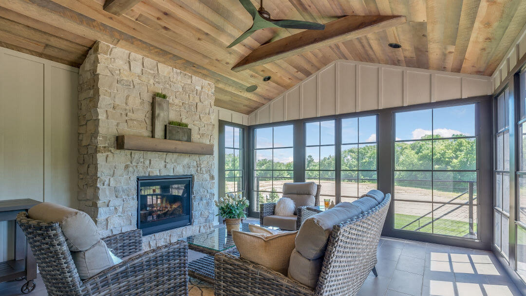 Anchor Your Sunroom with a Stone Fireplace