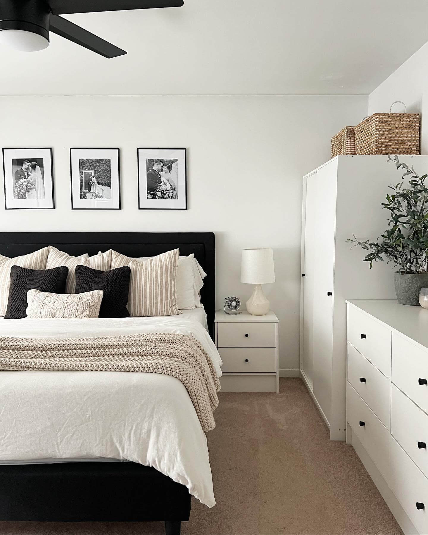 Triptych of Black and White Wedding Photos Above the Bed