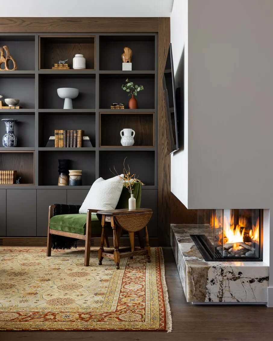 Dark-hued built-in shelving with varied object heights