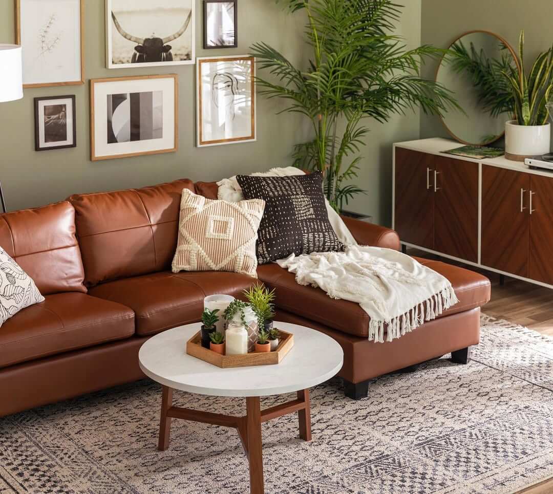 Round Mirror Adds Depth Above a Sleek Credenza