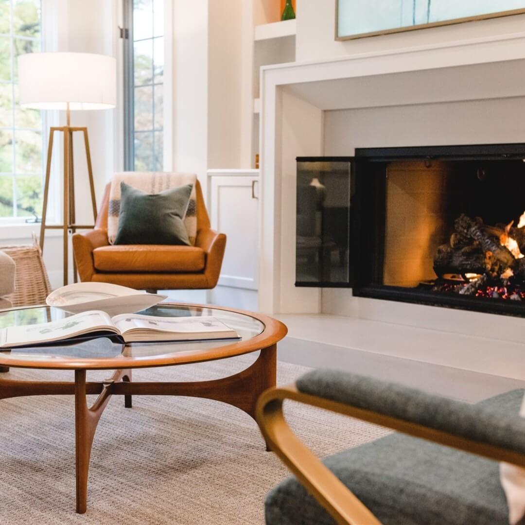 Anchor Your Seating With a Curved Wood Coffee Table