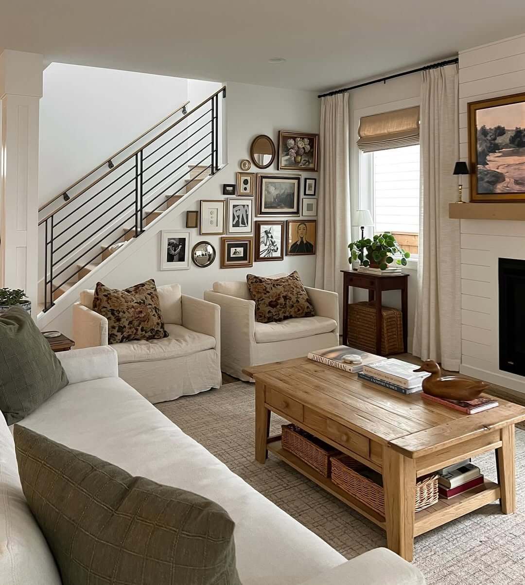 Gallery Wall Follows Staircase With Varied Frame Styles