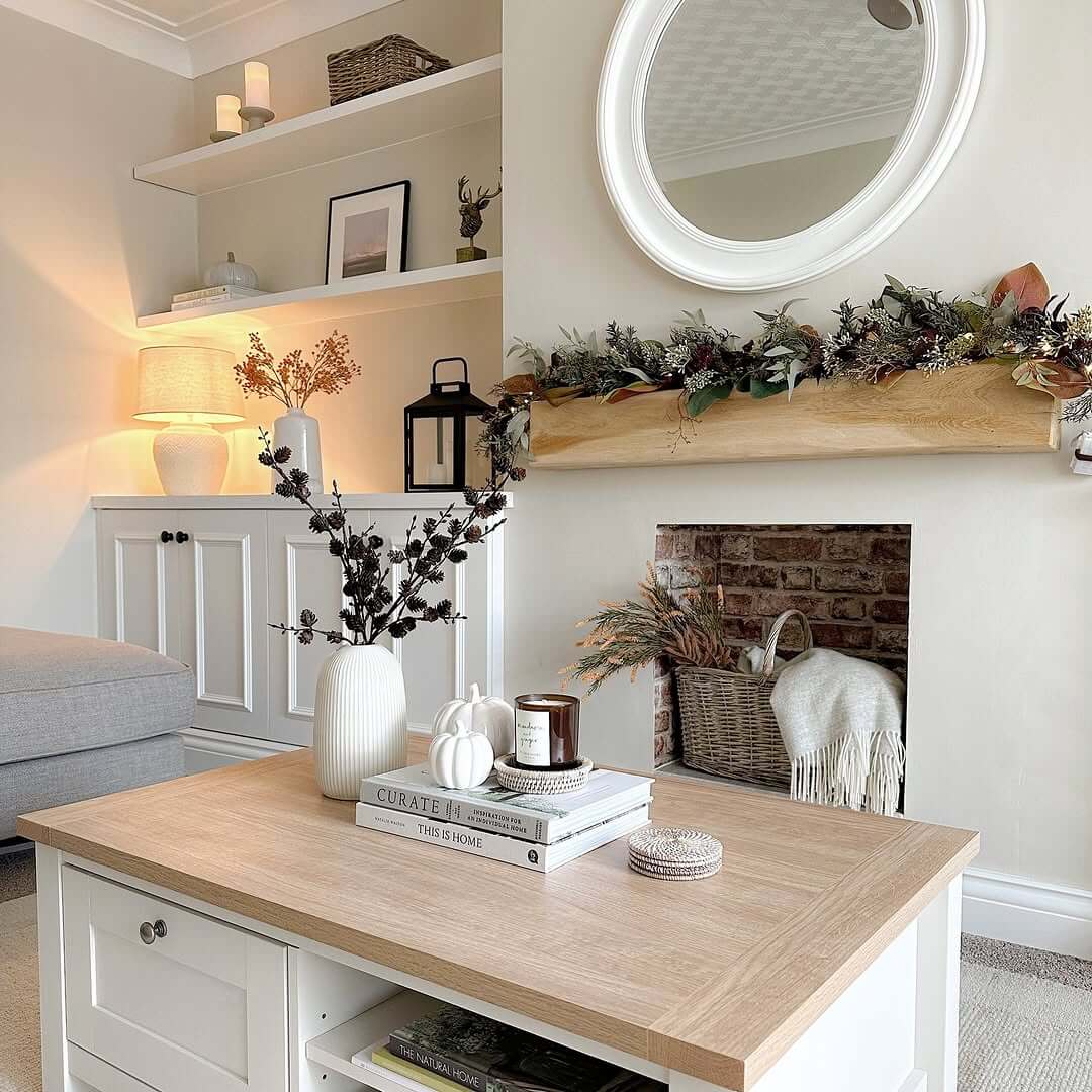 Wooden Mantel Garland Frames Fireplace With Seasonal Greenery