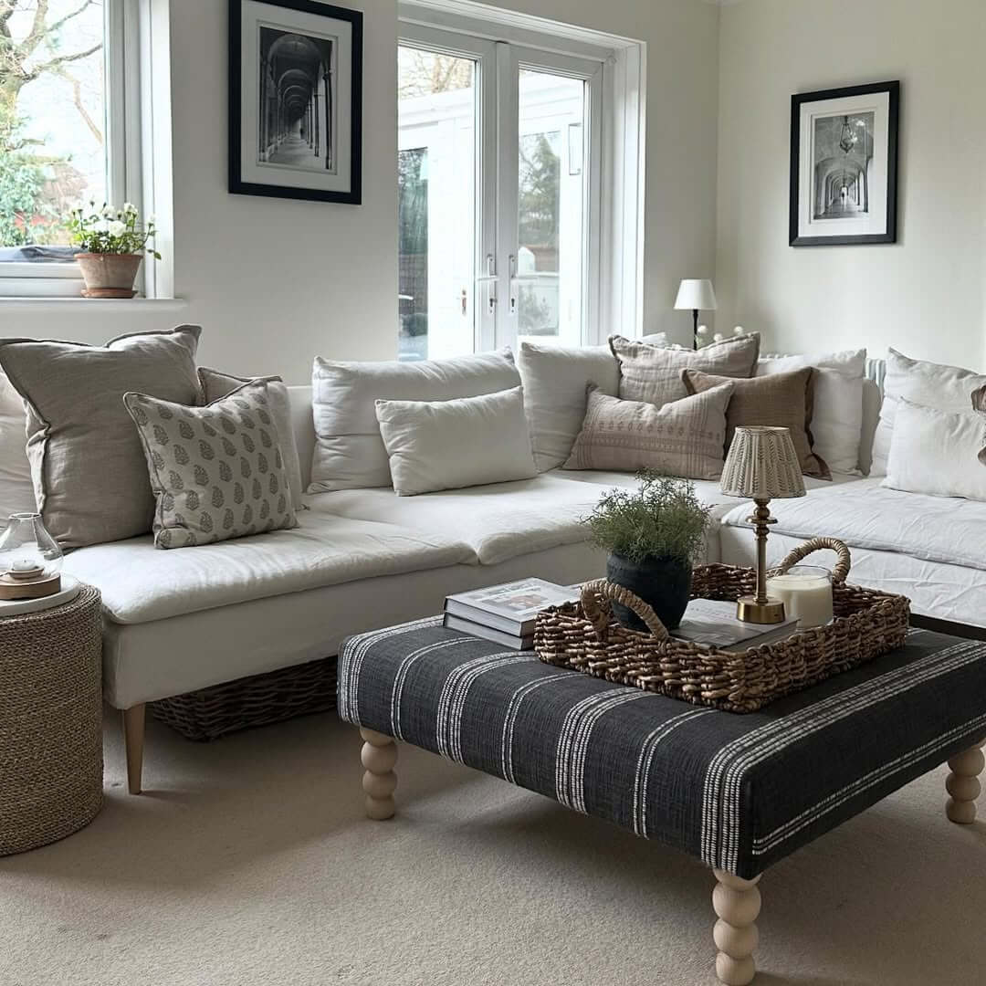 Striped Ottoman Adds Patterned Anchor to Neutral Seating