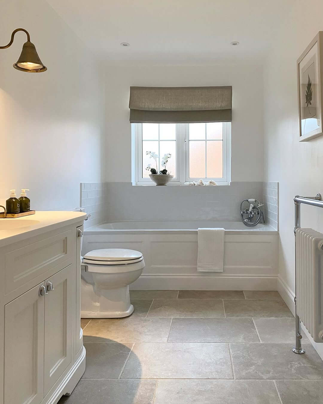 Fluted Wainscoting Adds Classic Detail to the Bathtub Surround