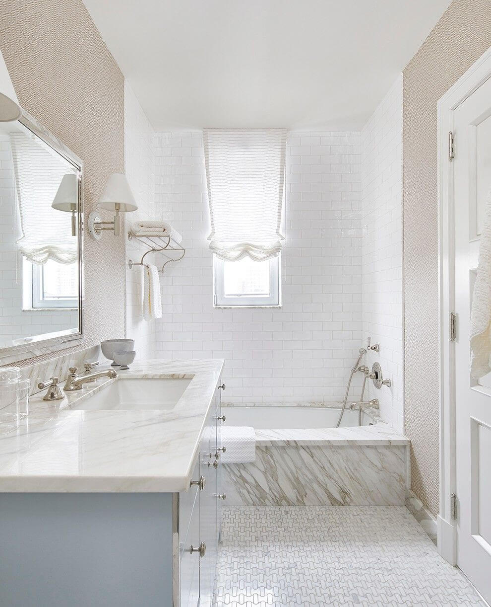 Marble Wraps the Bathtub Surround for a Luxurious Look