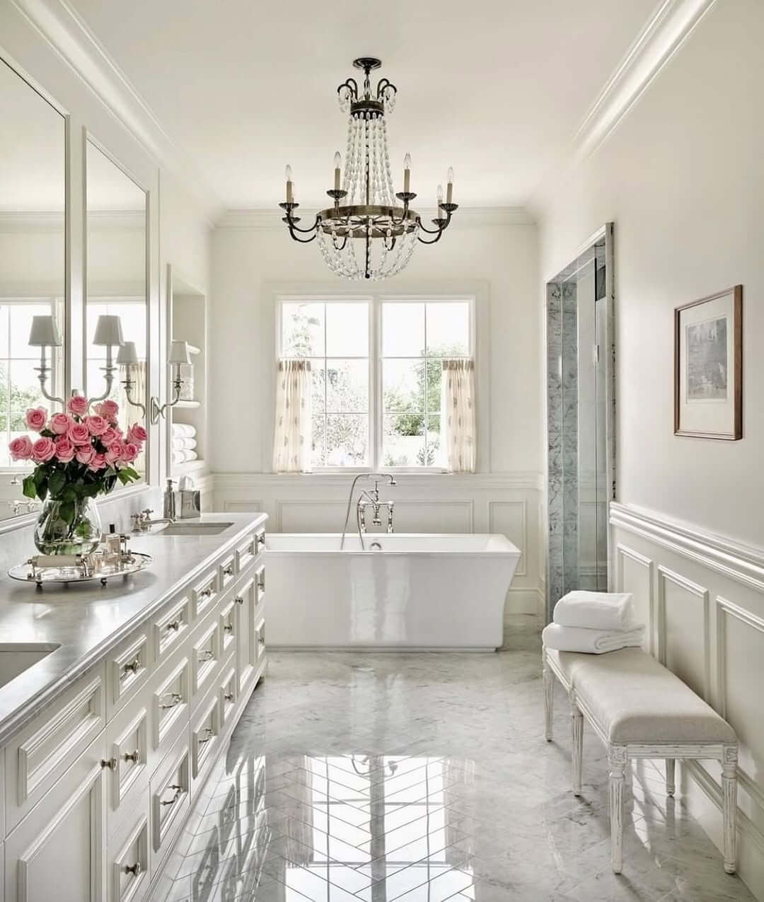 Crystal Chandelier Adds Glamour Above a Freestanding Tub