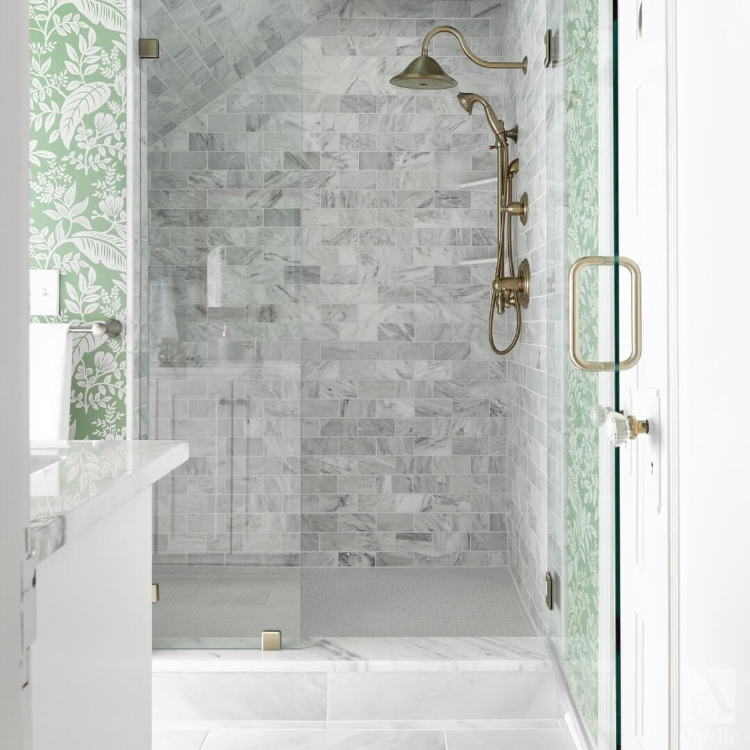 Brass Shower Fixtures Complement Marble Tile