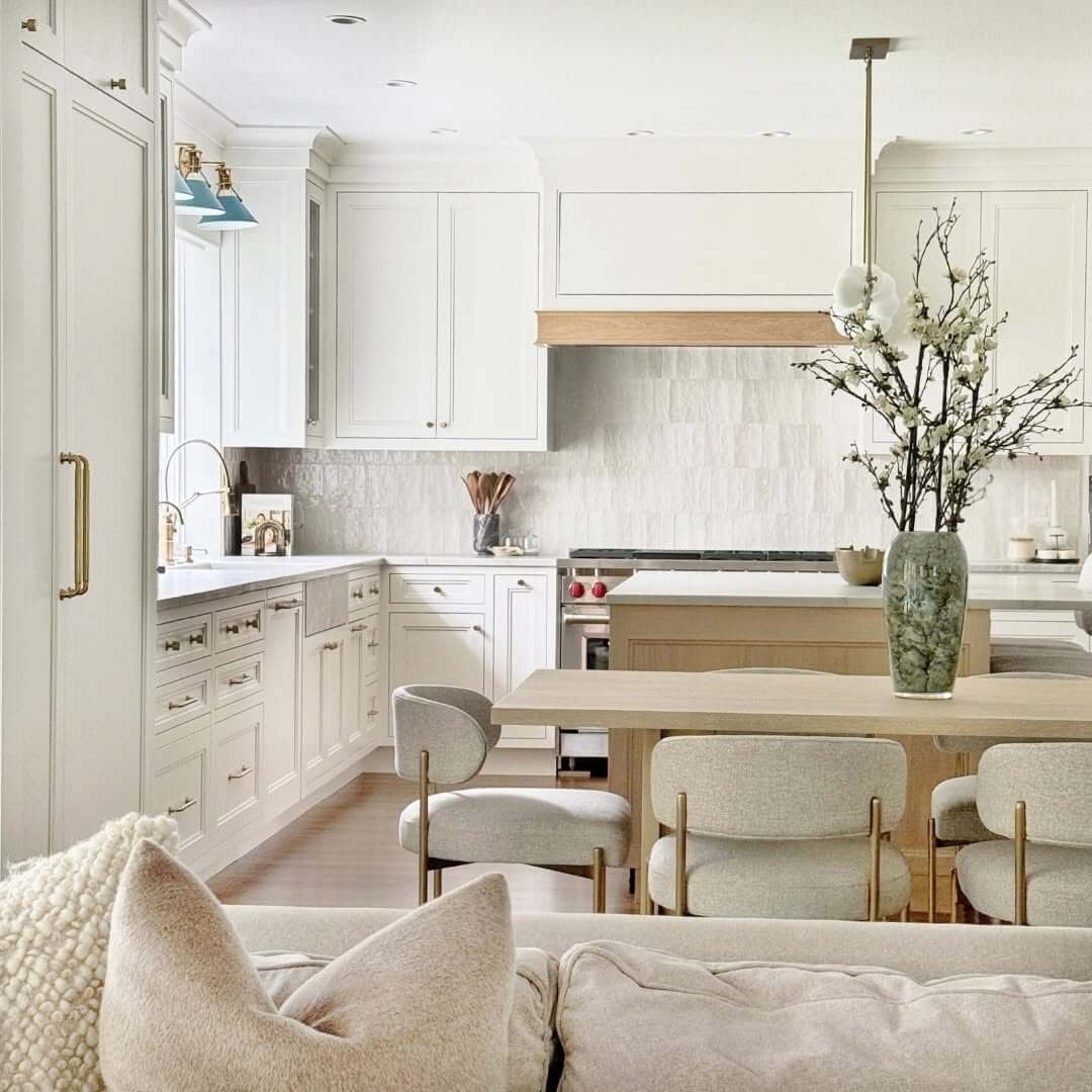 Textured Tile Backsplash Adds Subtle Dimension to White Cabinets