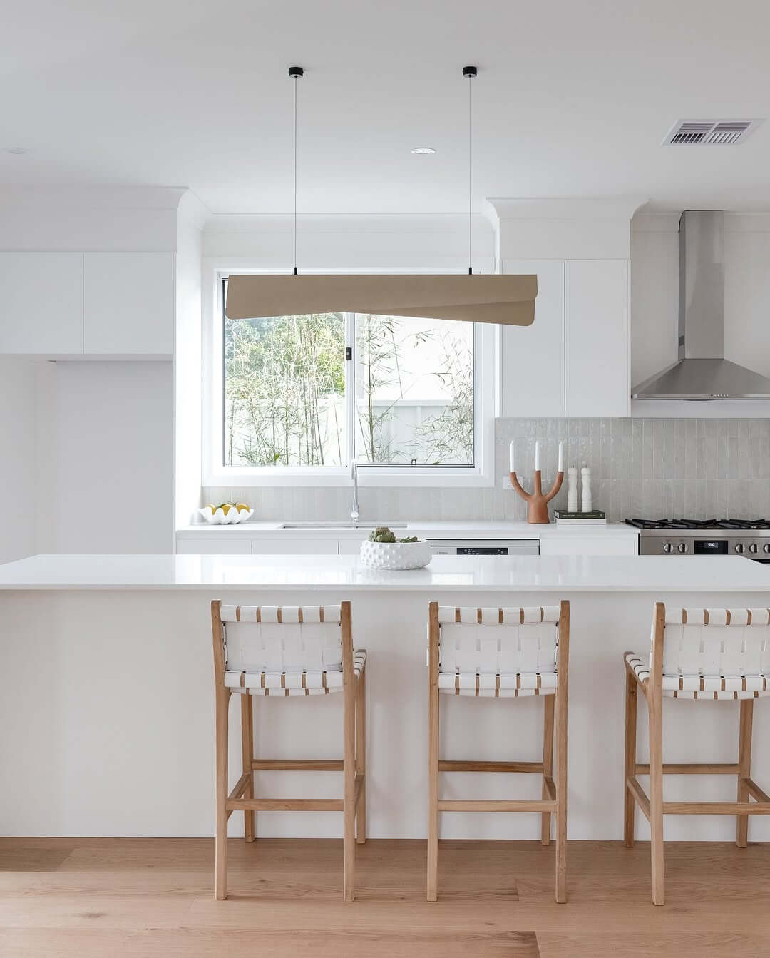 Sculptural Pendant Light Adds Artistic Flair Above the Island
