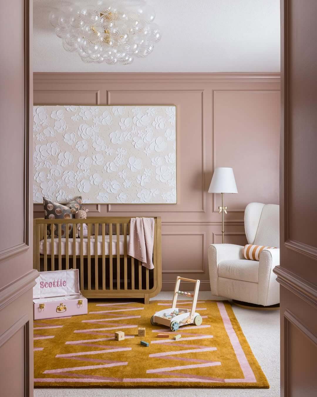 Textured Floral Art Adds Dimensional Whimsy Above the Crib
