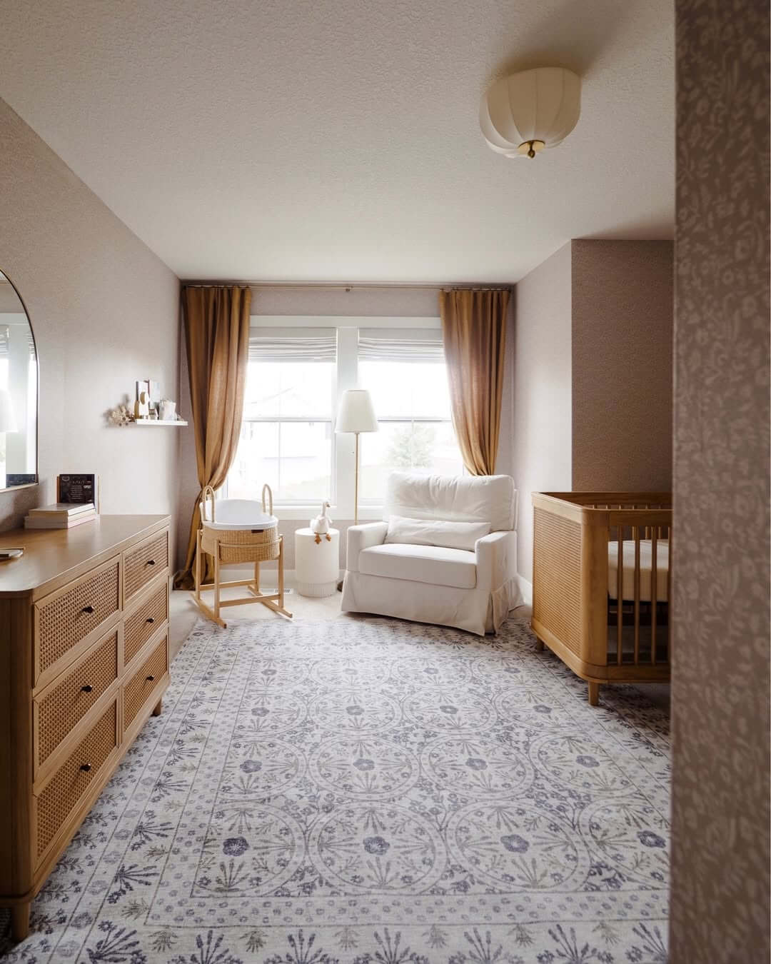 Patterned Area Rug Grounds the Girl Nursery