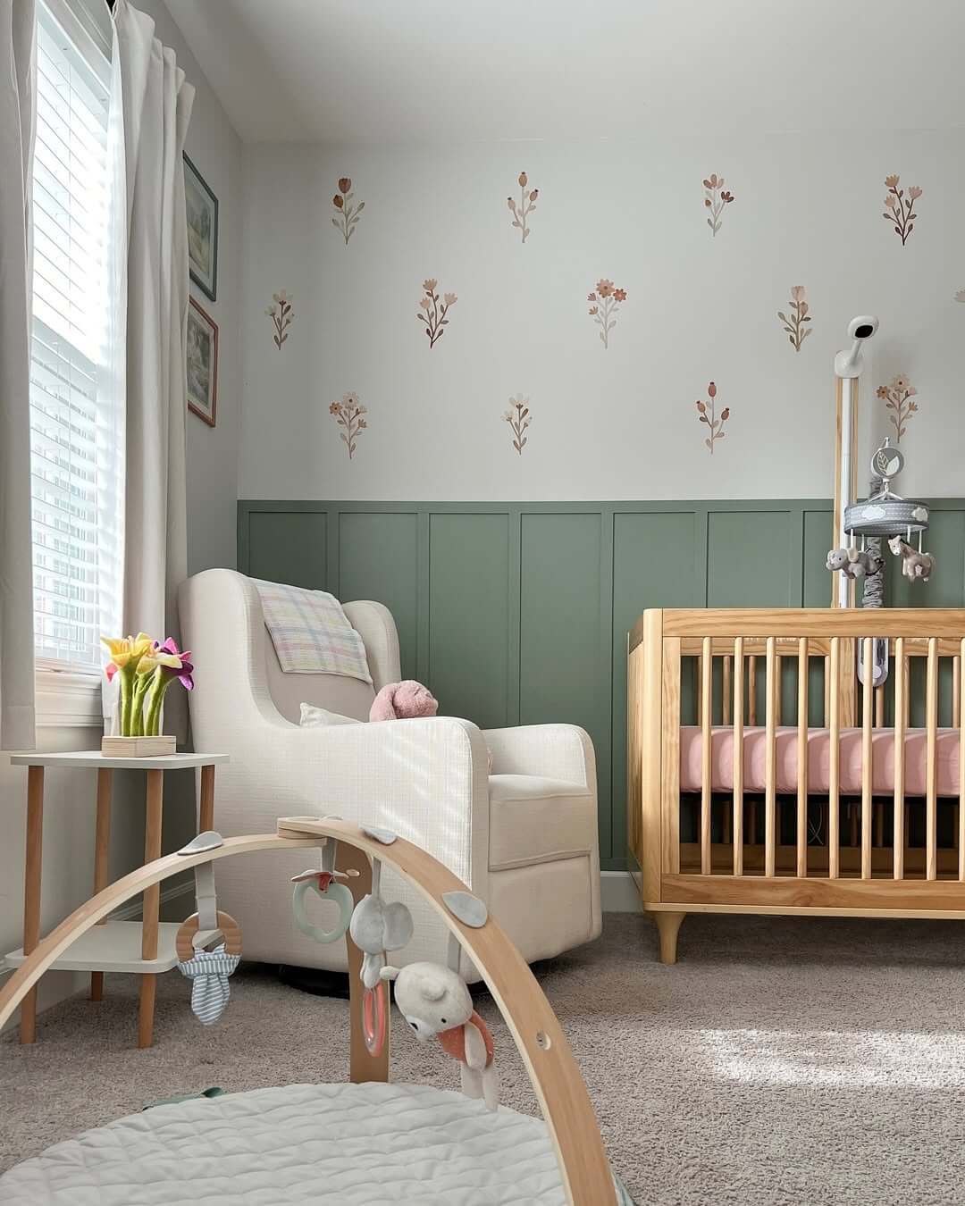 Delicate Floral Wall Decals Add Whimsy Above Green Paneling