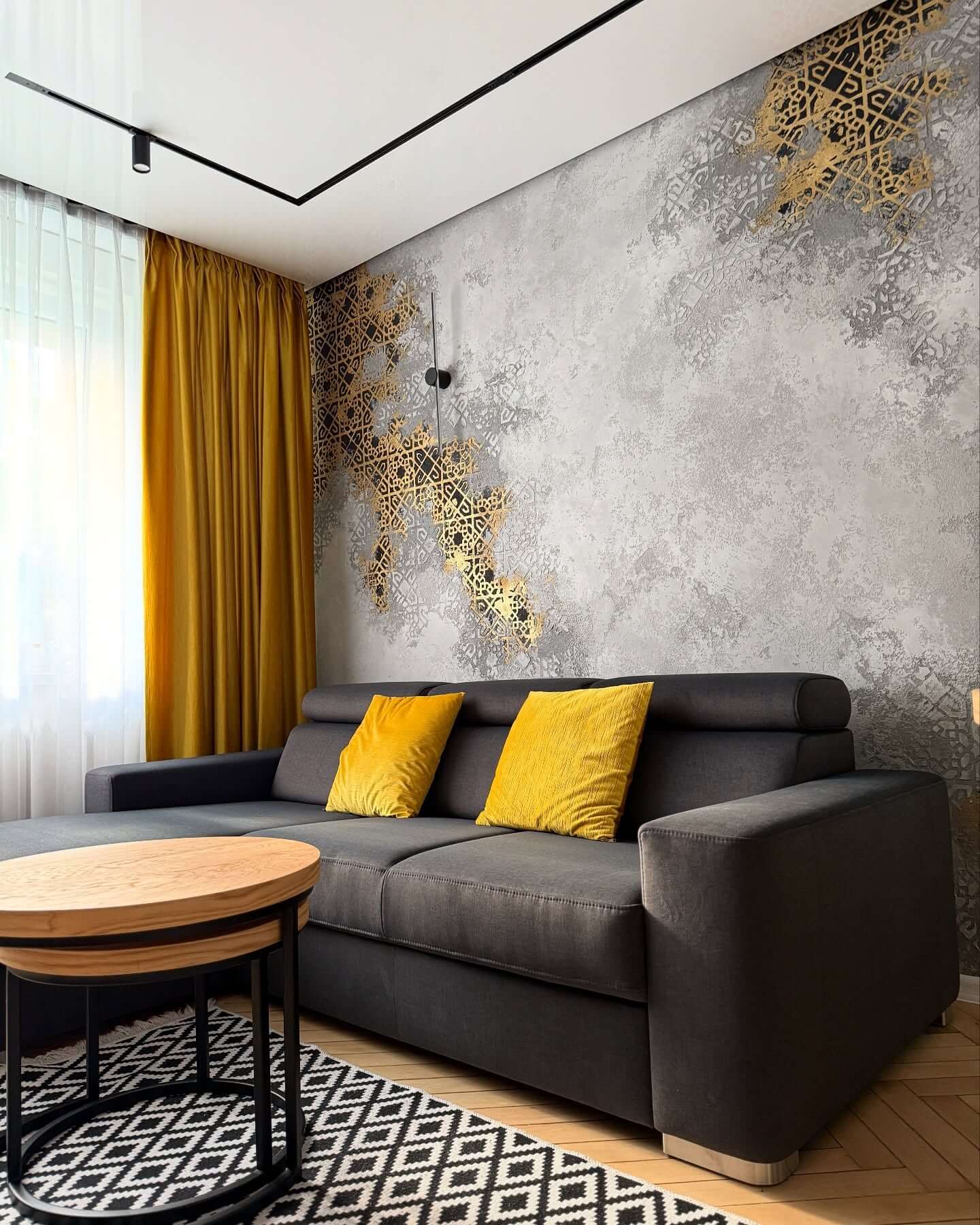 Incorporate Metallic Geometric Cutouts on a Textured Gray Wall