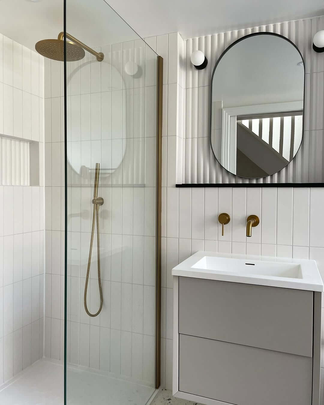 Vertical Tile and Fluted Walls Add Subtle Dimension