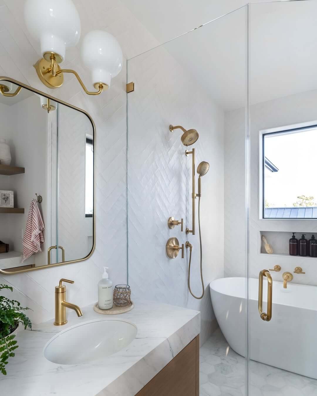 Herringbone Shower Tile Creates a Textured White Backdrop